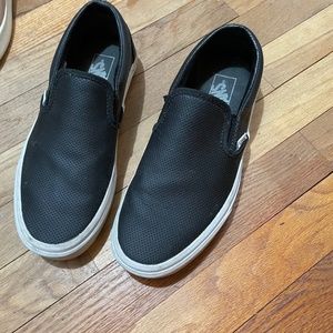 Black Vans slip ons